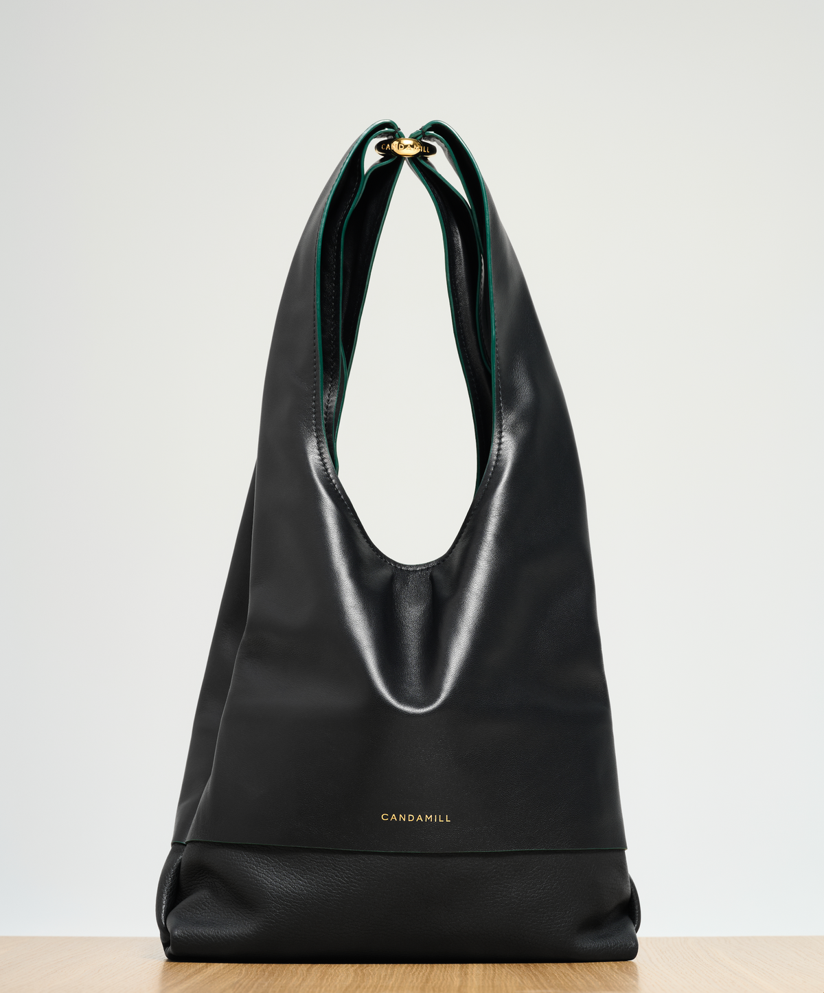 The Collector tote in Black leather with Gold hardware, front view