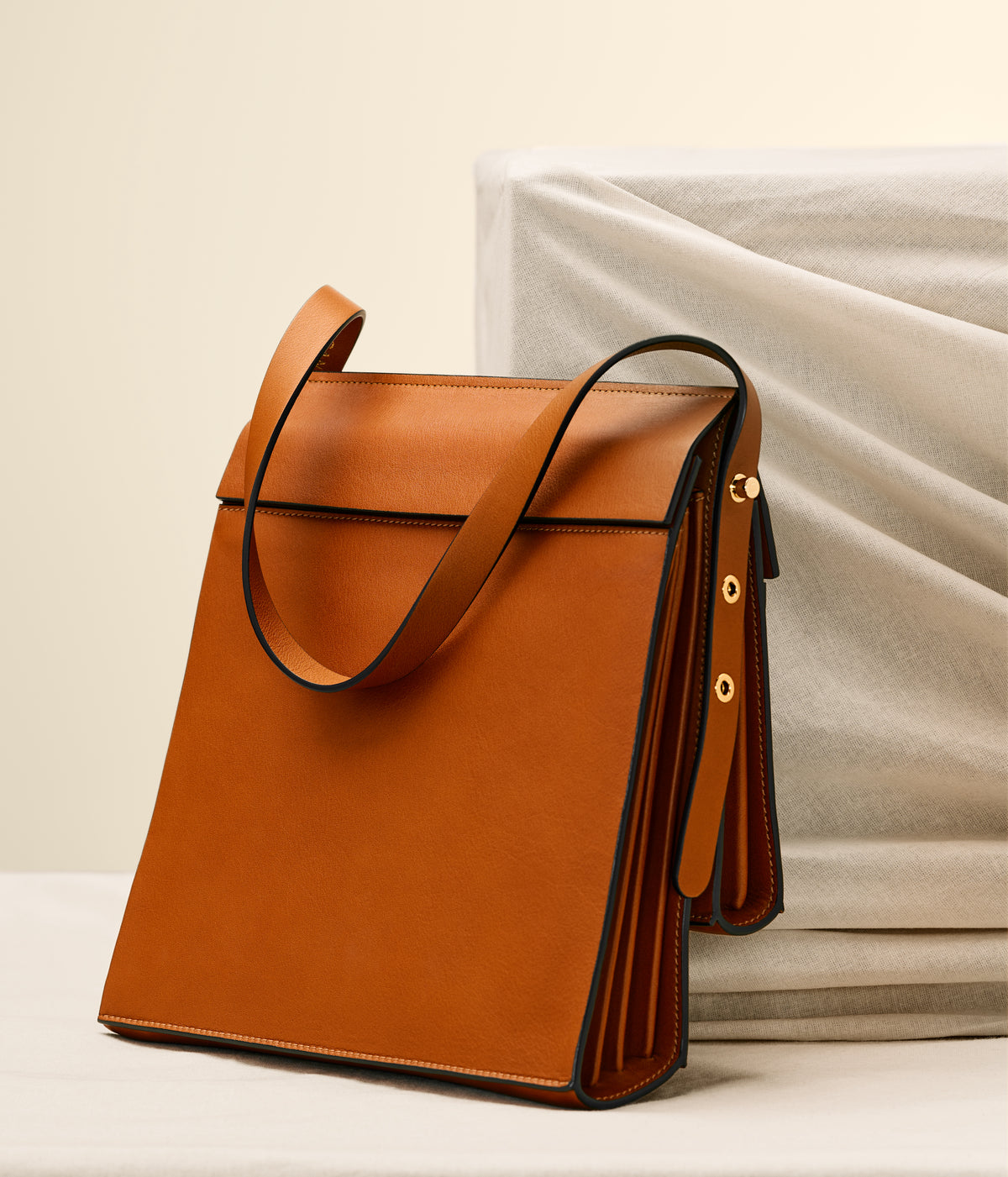 Rear view of the High Rise shoulder bag in Saddle leather