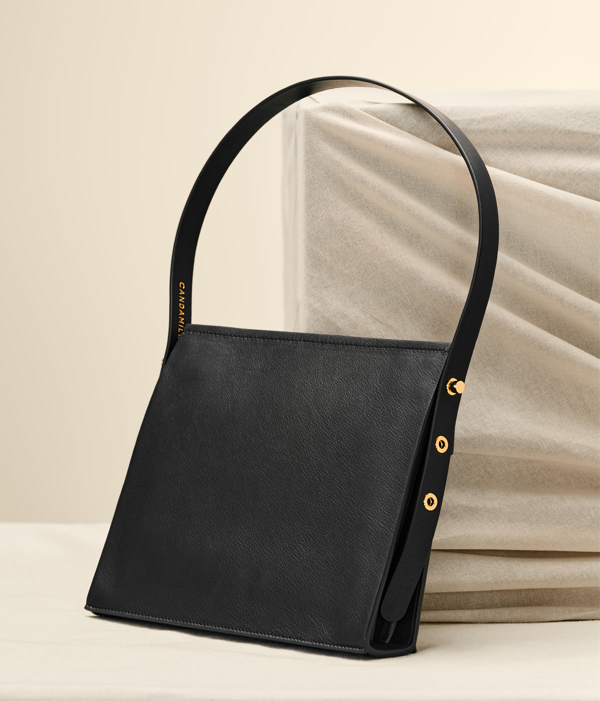 Rear view of the Low Rise shoulder bag in Black leather