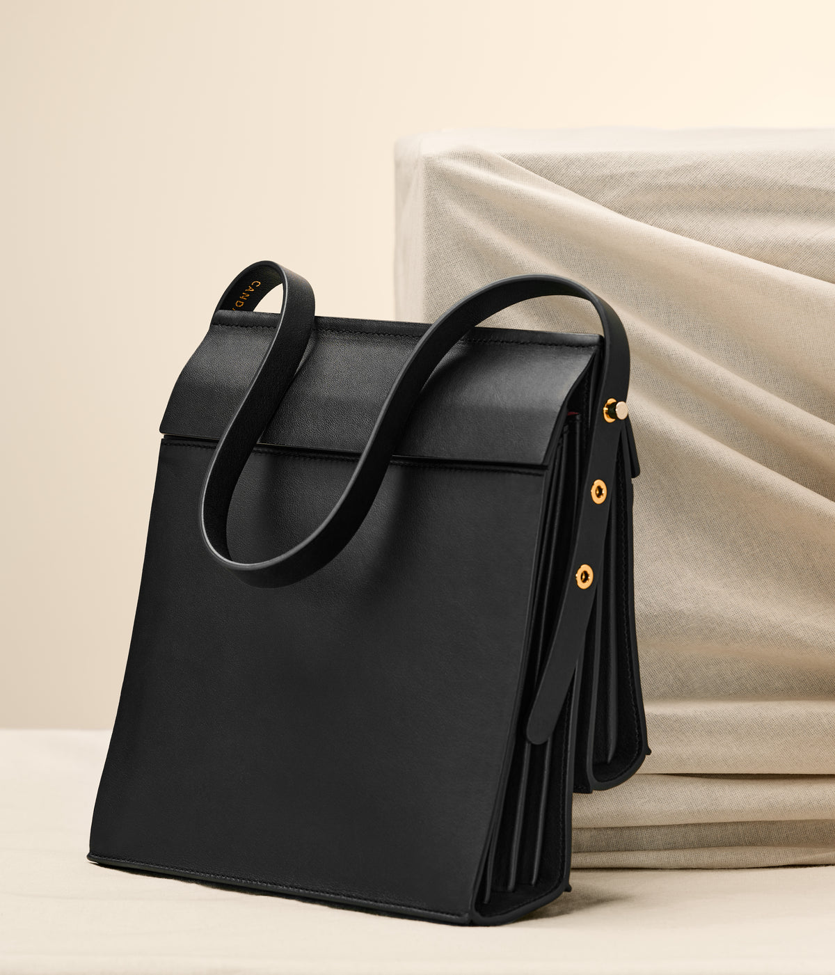 Rear view of the High Rise shoulder bag in Black leather
